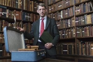Dr Nicolas Bell with the Duchess' blue suitcase