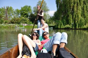 Students relaxing on punt